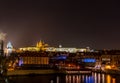 Cityscape of Prague surrounded by lights at night in the Czech Republic Royalty Free Stock Photo