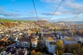 Cityscape on the red cable car with bright sky Overlooking the green fields of Kriens, Switzerland Royalty Free Stock Photo