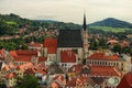 Cityscape with red tile roofs. Church of Saint Vitus- UNESCO World Heritage Site. Cesky Krumlov Krumau, Czech Republic