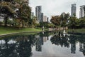 Cityscape that reflected on the pool near Petronas twin towers park`s pool in Kuala Lumpur, Malaysia Royalty Free Stock Photo