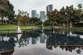 Cityscape that reflected on the pool near Petronas twin towers park`s pool in Kuala Lumpur, Malaysia Royalty Free Stock Photo