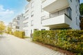 Cityscape of residential area with modern apartment buildings, new green urban landscape in the city