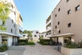 Cityscape of a residential area with modern apartment buildings, new green urban landscape in the city Royalty Free Stock Photo