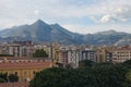 Cityscape with residential buildings in Palermo. Nice mountains in the background