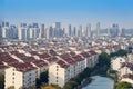 Cityscape of residential house rooftop and skyscraper