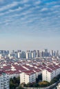 Cityscape of residential house rooftop and skyscraper