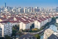 Cityscape of residential house rooftop and skyscraper