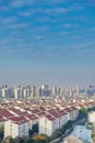 Cityscape of residential house rooftop and skyscraper