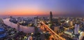 Cityscape of River in Bangkok city with high office building in night time