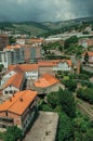 Cityscape with road and building amid trees