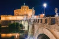 Cityscape romantic night view of Roma. Panorama with Saint Angelo castle and bridge. Famous tourist destination with Tiber. Travel