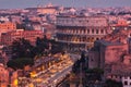 Cityscape of Rome at dusk with Colosseum Royalty Free Stock Photo