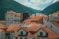 Cityscape with rooftops of houses and hilly landscape Royalty Free Stock Photo