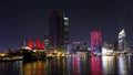 Cityscape of Saigon with colorfully illuminated buildings at night in Vietnam