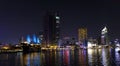 Cityscape of Saigon with colorfully illuminated buildings at night in Vietnam