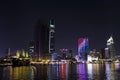 Cityscape of Saigon with colorfully illuminated buildings at night in Vietnam