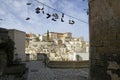 A cityscape of The Sassi of Matera which constitute the historic center of the Matera