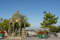 Cityscape or seascape of a decorative metal canopy in a Dublin marina