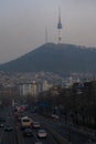 Cityscape of Seoul Namsan Tower from Noksapyeong Bridge near Itaewon street during winter morning at Yongsan-gu , Seoul South