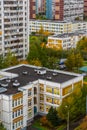 Cityscape in sleeping area in fall with kindergarten and school in Moscow, Rusia