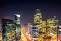 Cityscape of South Korea. Night traffic speeds through an intersection in the Gangnam district of Seoul, Korea. Royalty Free Stock Photo