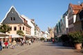 Cityscape of Speyer with its historical downtown and houses. People walking around.