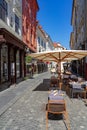 Cityscape street with restaurant table in Ljubljana Slovenia