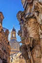 Cityscape - street view with sculpture of gatekeeper against the backdrop of the Dresden Frauenkirche Royalty Free Stock Photo