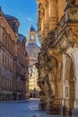 Cityscape - street view with sculptures of gatekeepers on the George Gate of Dresden Castle