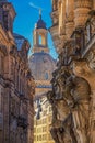 Cityscape - street view with sculptures of gatekeepers on the George Gate of Dresden Castle