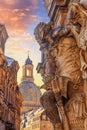 Cityscape - street view with sculptures of gatekeepers on the George Gate of Dresden Castle