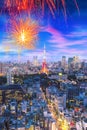 Cityscape of Tokyo, city with firework display for celebration,  aerial skyscraper view of office building and downtown and street Royalty Free Stock Photo