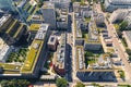 Cityscape top of the summer town residential houses with grass covering some of the rooftops. Housing and estate concept