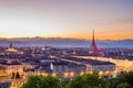 Cityscape of Torino Turin, Italy at dusk with colorful sky