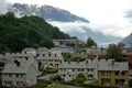 Cityscape of Tyssedal village near Odda,Norway,houses with old norwegian traditional roofs,scandinavian nature,morning