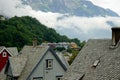 Cityscape of Tyssedal village near Odda,Norway,houses with old norwegian traditional roofs,scandinavian nature,morning