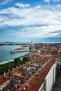 A cityscape of Venice, view of picturesque old buildings and Santa Maria della Salute Cathedral from the bell tower at Saint Mark Royalty Free Stock Photo