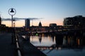 Cityscape view of Dublin by river Liffey with a hazy skyline at dusk. Royalty Free Stock Photo