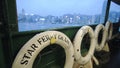 Cityscape View From The Glass Window Of Star Ferry Cruising In Victoria Harbour Between Hong Kong I