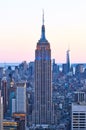 Cityscape view of Manhattan with Empire State Building at sunset