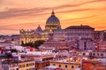 Cityscape view of Rome at sunset with St Peter Cathedral in Vatican Royalty Free Stock Photo