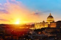 Cityscape view of Rome at sunset with St Peter Cathedral in Vatican Royalty Free Stock Photo