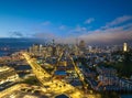 Cityscape view of San Francisco and the Bay Bridge with Colorful Sunset from island