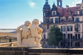 Cityscape - view of the sculpture of a pair of cupids against the backdrop of Dresden Castle close-up Royalty Free Stock Photo