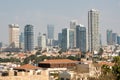 Cityscape view of small houses and modern skyscrapers in Tel Aviv, Israel