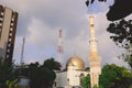 Cityscape View to the White and Golden Minaret and Dome of the largest Grand Friday Mosque in Maldives