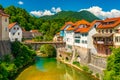 Cityscape of ÃÂ kofja Loka, Slovenia. View of the Capuchin Bridge over the SelÃÂ¡ka Sora River in the old city center