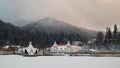 Ciucas lake in winter. Baile Tusnad, Romania. Europe, fores