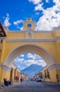 Ciudad de Guatemala, Guatemala, April, 25, 2018: The famous arch of the city center of Antigua together with agua Royalty Free Stock Photo