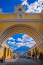 Ciudad de Guatemala, Guatemala, April, 25, 2018: The famous arch of the city center of Antigua together with agua Royalty Free Stock Photo